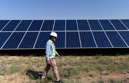 Solar panels and renewable energy infrastructure project in India.
