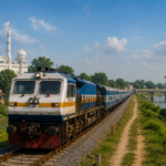 Centre revives Qadian-Beas railway line project after nearly a century to strengthen connectivity in Punjab Passenger train travelling along a railway line beside a river in Punjab, representing the revived Qadian-Beas rail connectivity project.