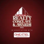 he official logo for the "ET Now.in Realty Conclave & Awards 2026," featuring the event title and the tagline "In association with OneXtel Communication Media" against a dark red gradient background.