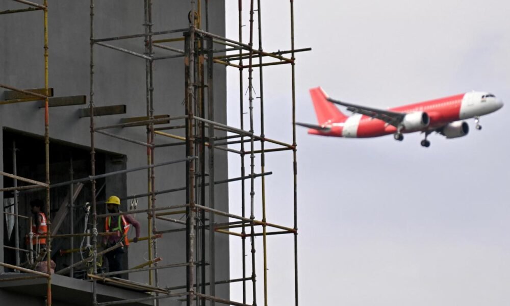 Modern airport terminal and aviation infrastructure development project in India.