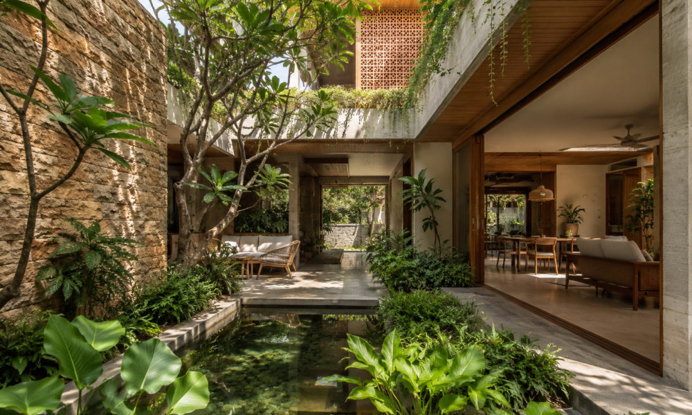 Modern luxury Indian home designed with courtyards, sandstone walls and greenery for climate-responsive living