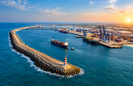 Container ships and cargo infrastructure at V.O. Chidambaranar Port in Thoothukudi.